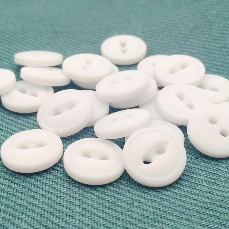 18L 11.5mm 2 holes fish eye resin button with rim in dull white color, dyeable resin button