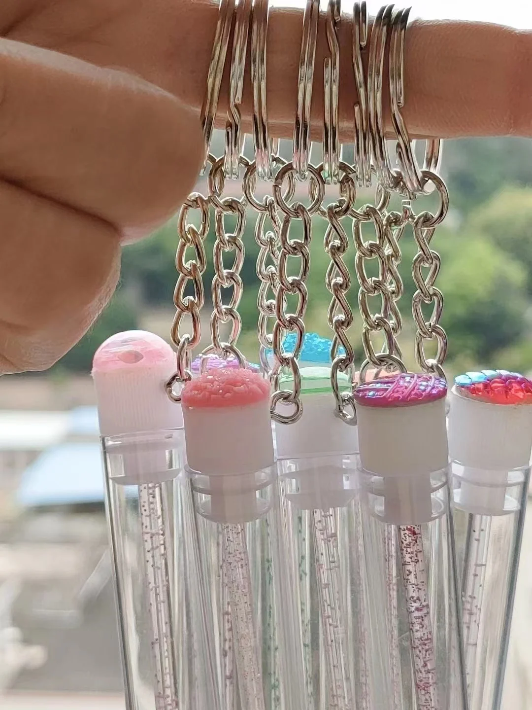 Wholesale OEM lash spoolie unique eyelash brush empty mascara tubes with brush keychain