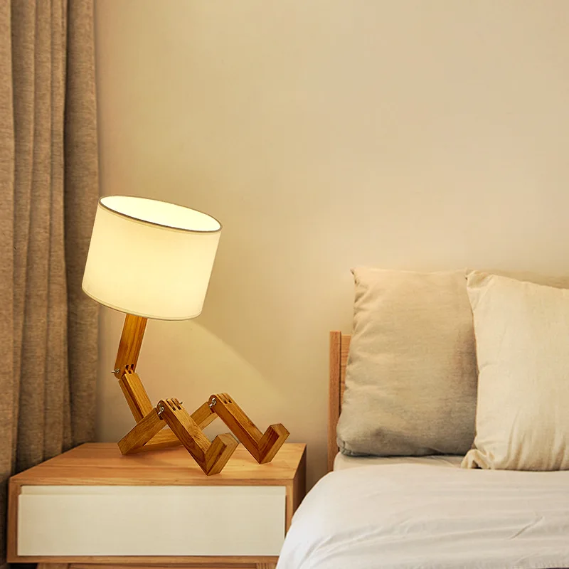 Solid wood humanoid lamp creative Nordic fashion style study bedroom bedside desk light wood robot folding LED table lamp