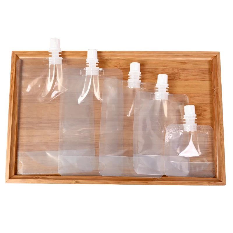 Wholesale custom spouted stand up food pouches packaging transparent spout pouch for liquid milk drink packaging