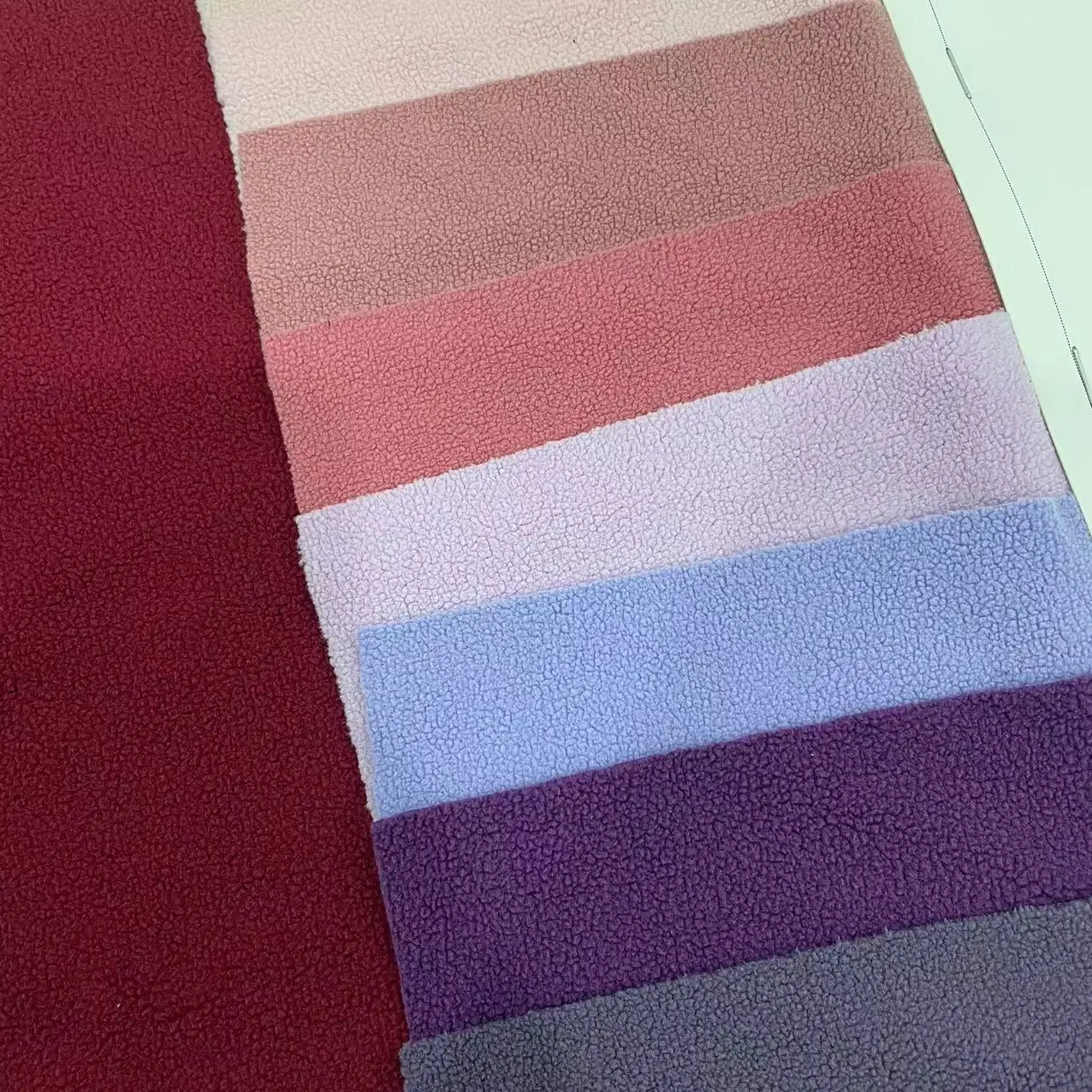 Custom Soft Fabric Textile Raw Material 100 Polyester Solid Flannel Fleece Fabric For Blanket And Garments