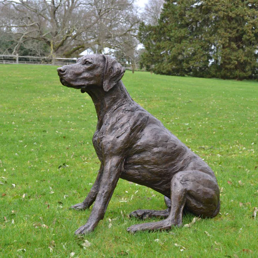 Brown dog bumpy bronze statue for the garden