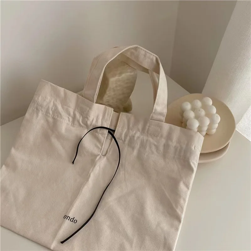 Xuerry Wholesale Small MOQ eco-friendly reusable nature drawstring bag custom logo print shopping tote bag canvas cotton bag