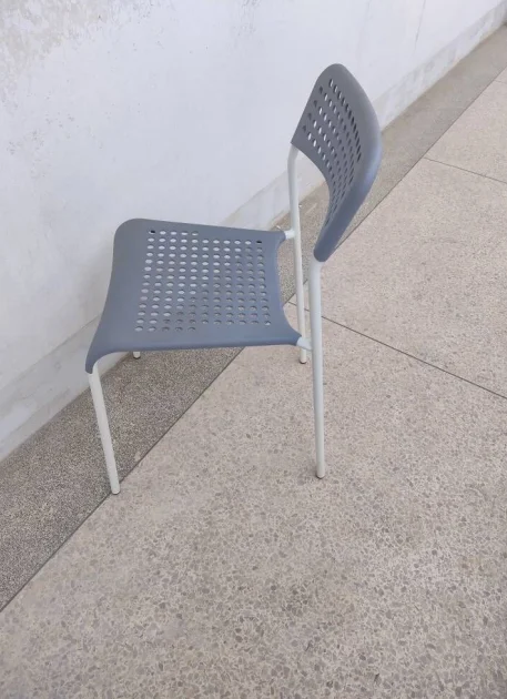 Fancy grey outdoor hotel banquet metal dining chair with holes