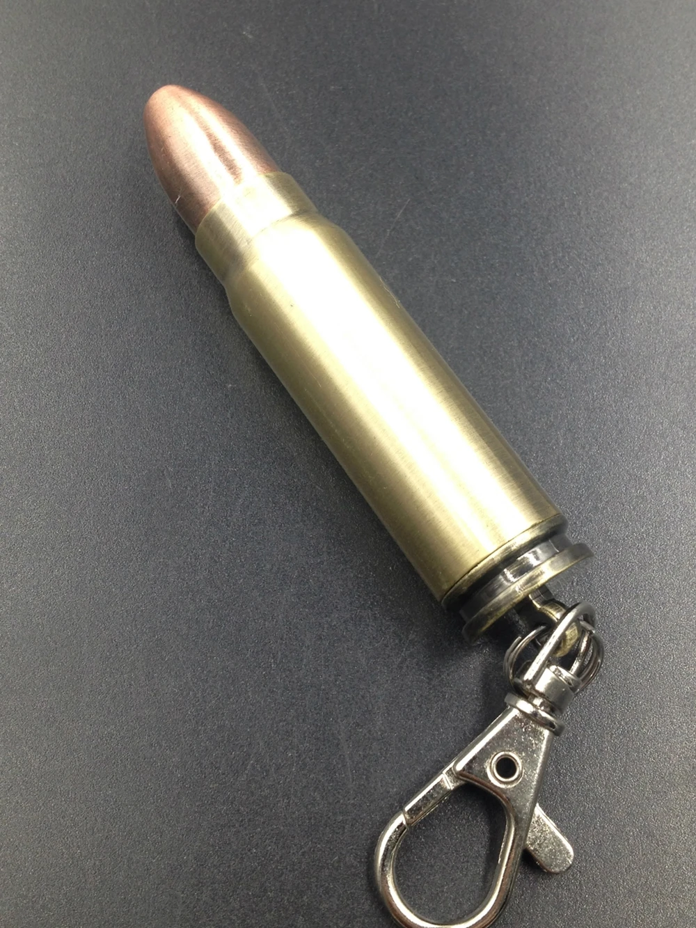 Wholesale ten thousand matches cool bullet shape flint kerosene refillable keychain lighters