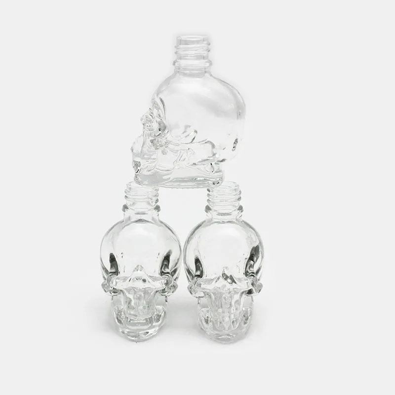 Wholesale 25ml Clear Skin Care Cosmetic Glass Bottle Skull Head Dropper Essential Oil Glass Bottles