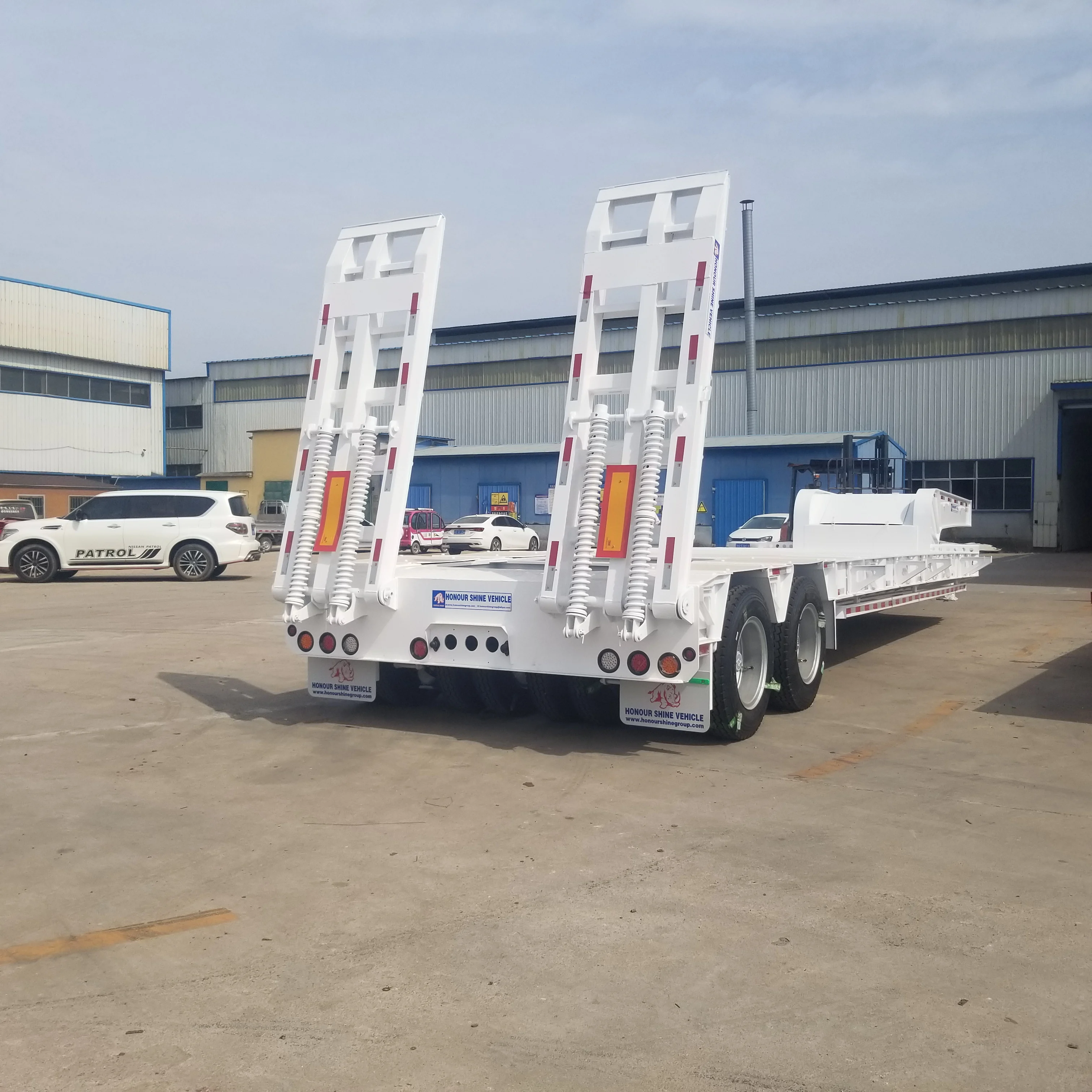 Best Selling 2 Axles 40FT 3 Axle 30 ton flat bed 50 ft tandem bogie 20ft 40ft 60ft low flatbed container semi trailer