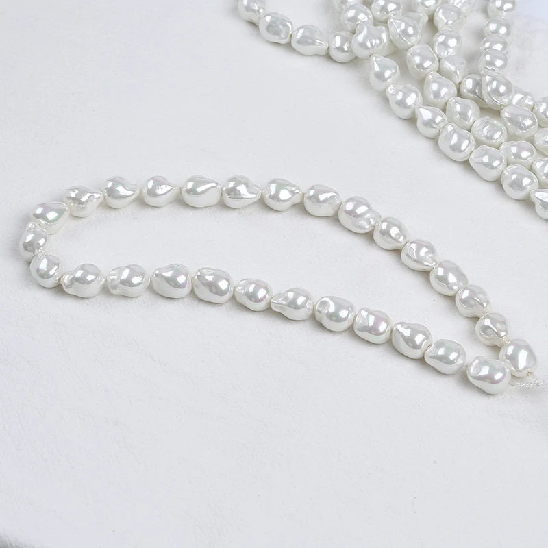 Hot sale Natural White 10*15mm/15*22mm/12*15mm Large Baroque Shape Shell Loose Pearl Strand