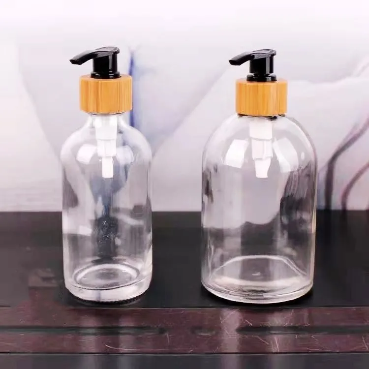 Custom Printing 120ml 4oz 250ml 8oz Clear Boston Round Empty Cosmetic Glass Shampoo Pump Lotion Bottle With Bamboo Pump