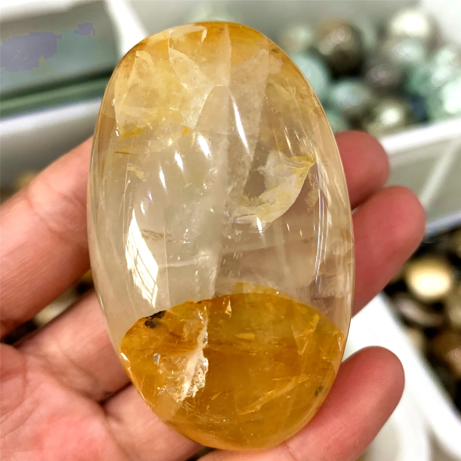 
Wholesale Yellow Hematoid Golden Palm Reiki Quartz Fire Quartz Crystal Palm For Decoration 