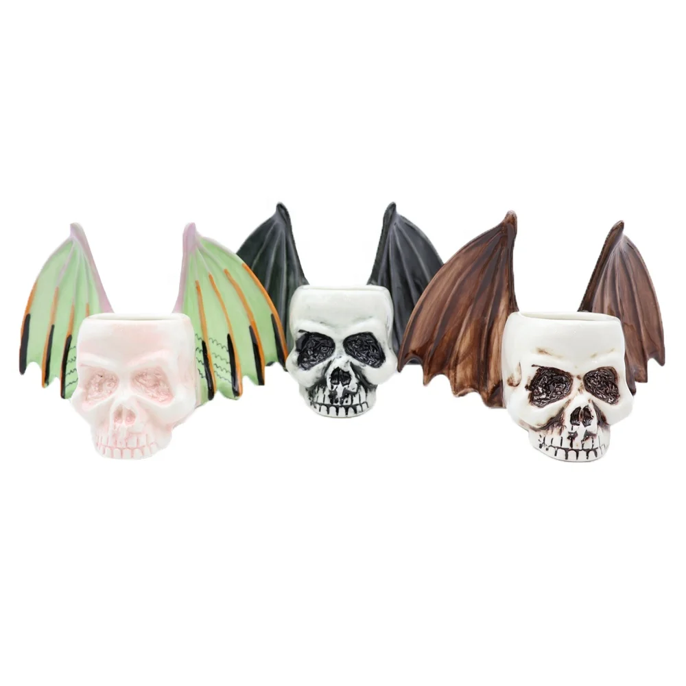 Customize wholesale high quality handmade skeleton head with wings beer wine cocktail glasses ceramic sugar skull tiki mug