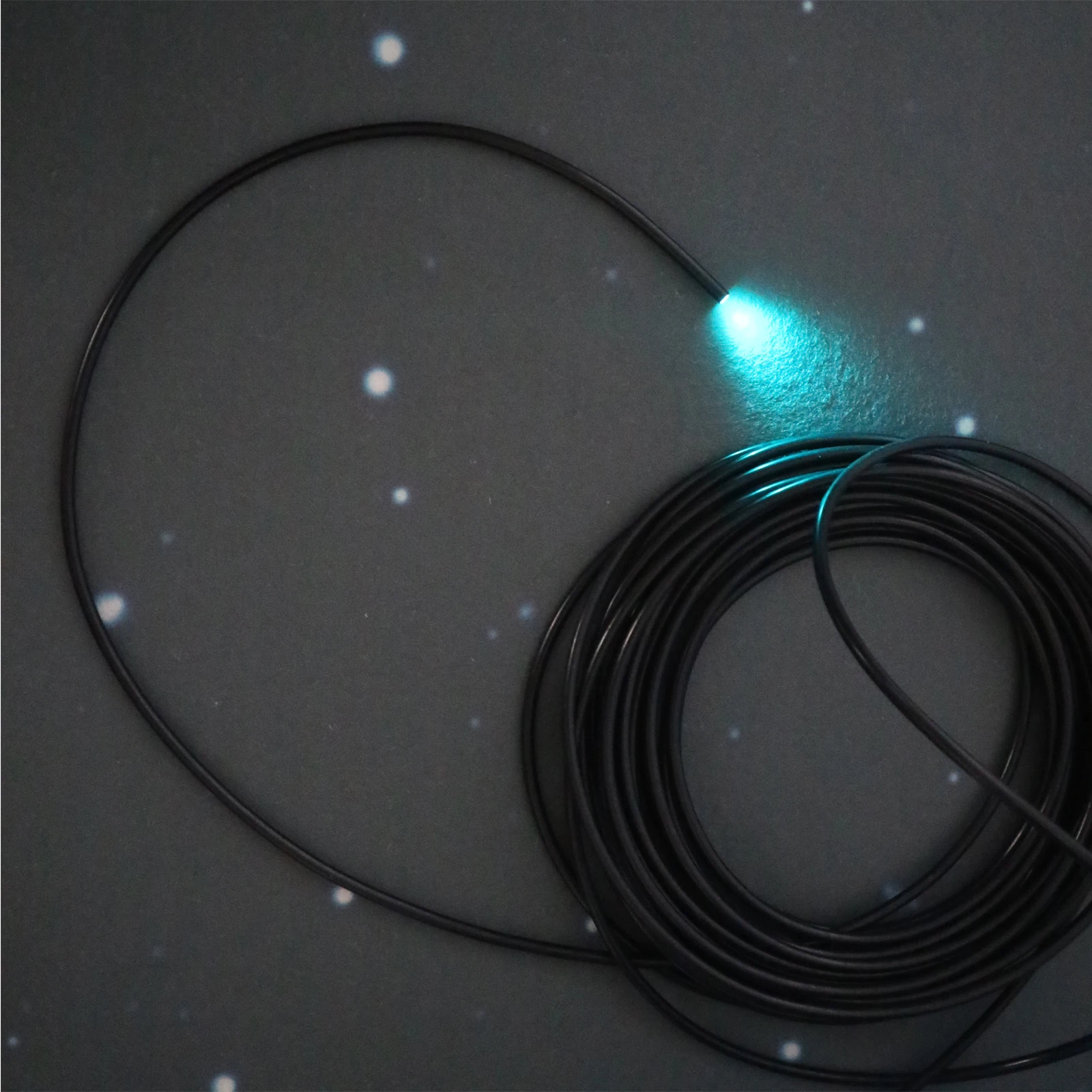 China manufacture inner core 4mm outer 5mm end light decorative plastic fiber optic  with black jacket for lighting