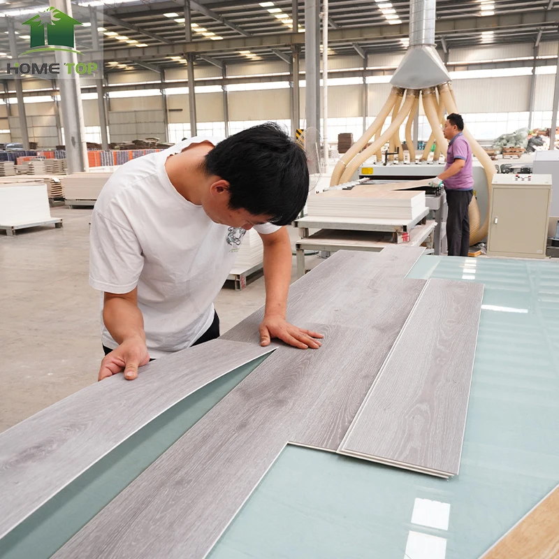 Spc Flooring Low Price 0.3-0.5mm Wear Layer Unilin Click Waterproof Ecofriendly 1-2mm IXPE EVA Underlay 4-6mm Thickness