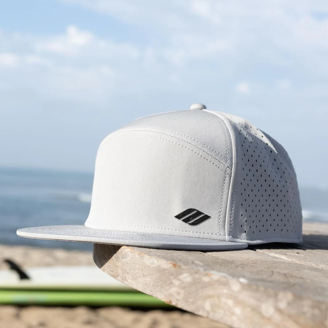 custom laser cut perforated snapback cap 7 panel hat waterproof trucker hat flat bill performance golf hat with rubber patch