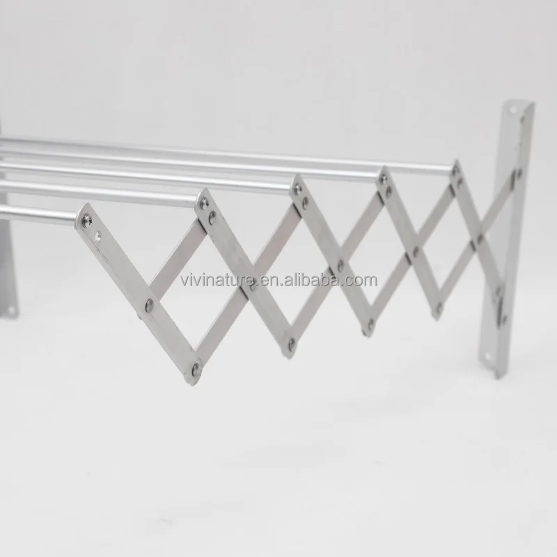 Wall mounted telescopic towel hanger and clothes rack