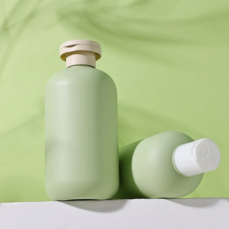 Eco friendly hair body skin care bottles set toner lotion shower gel wash shampoo container empty green hdpe plastic bottle