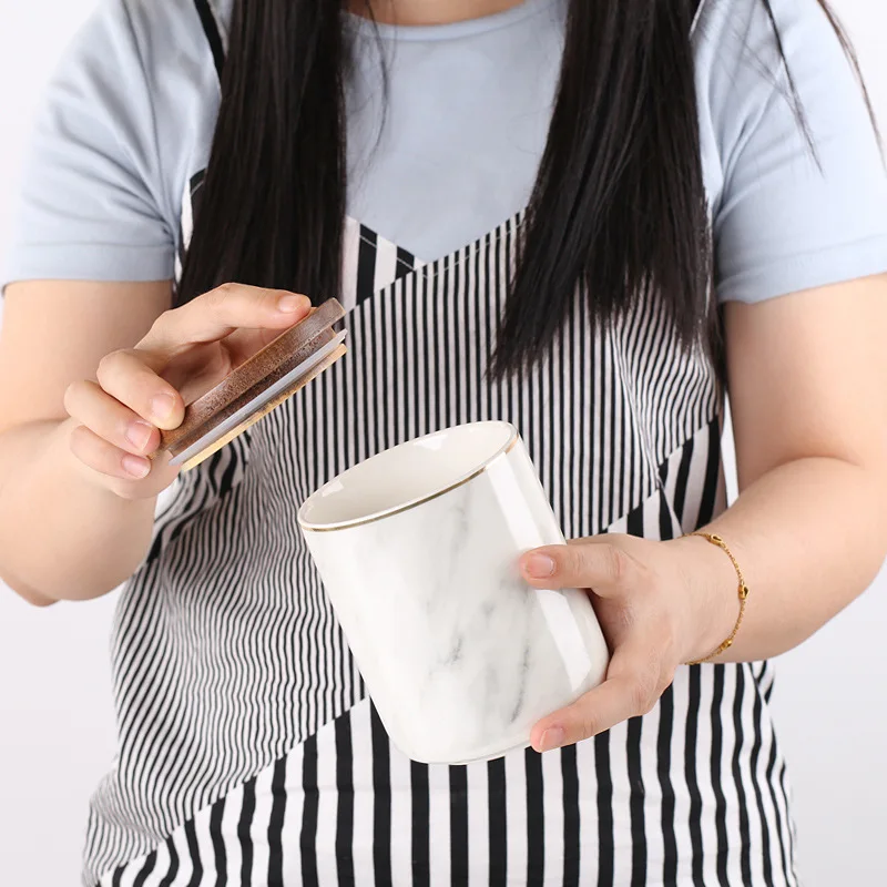 Custom simple home decor marbling porcelain storage jar with wood lid ceramic sealed tanks candy coffee tea container