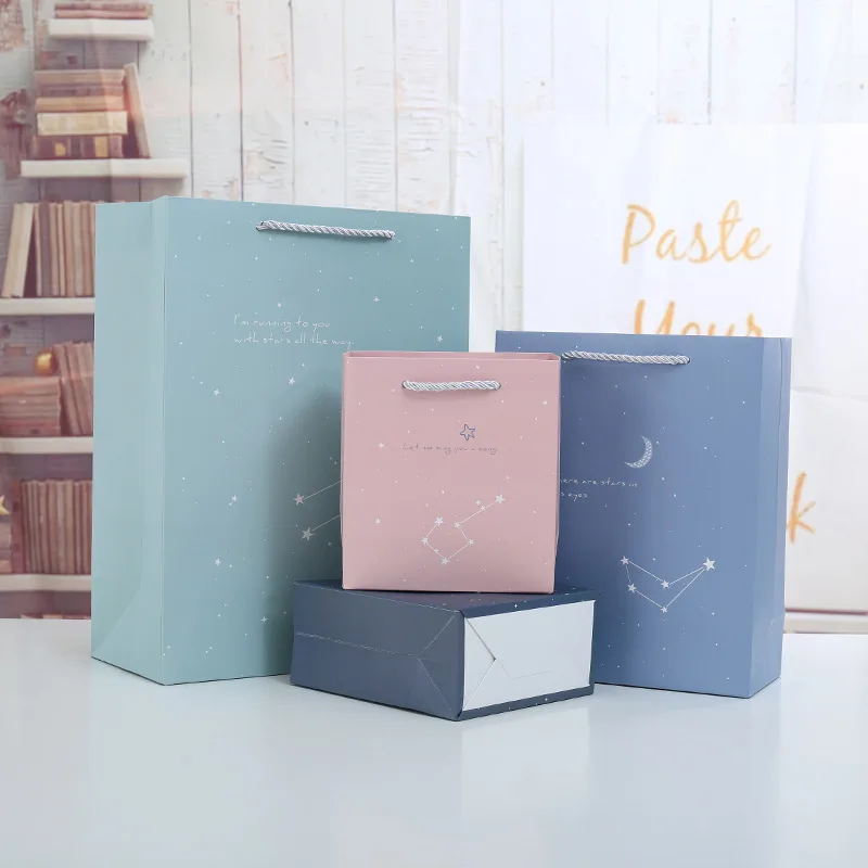 New Style Wholesale Fashion Clothing Shopping Paper Bag Starry Sky Simple Solid Color Cardboard Gift Bag Customization