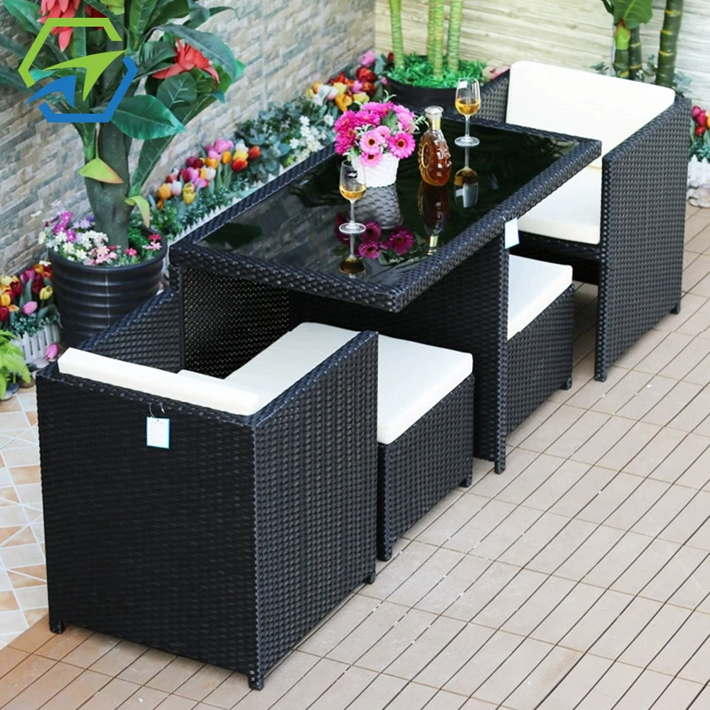 Hot Sale Exclusive Outdoor Poly Rattan patio furniture dining set table and chairs with umbrella