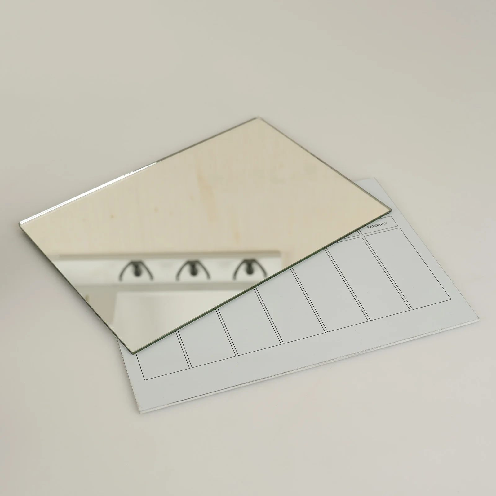 Wall mounted multifunctional wooden organizer with mirror, weekly calendar, and white dry erase board