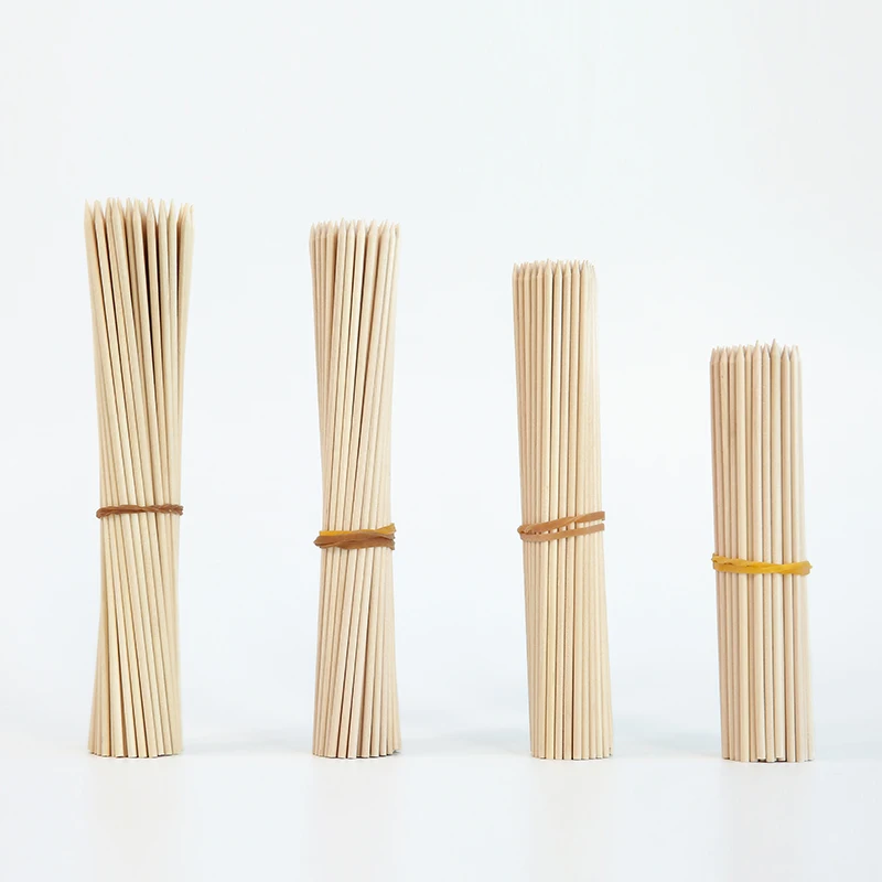 100% natural wooden sticks thick round bamboo sticks china with custom logo