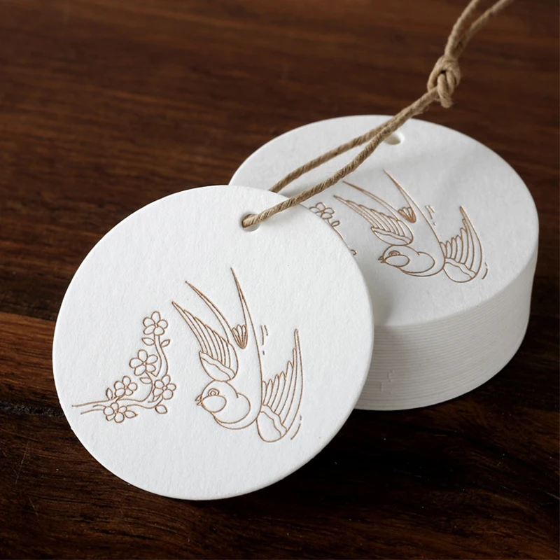 Wholesale Luxury Custom Logo Embossed Clothing Hang Tag Thick Paper Garment Hang Tag White Garment Tags And Labels
