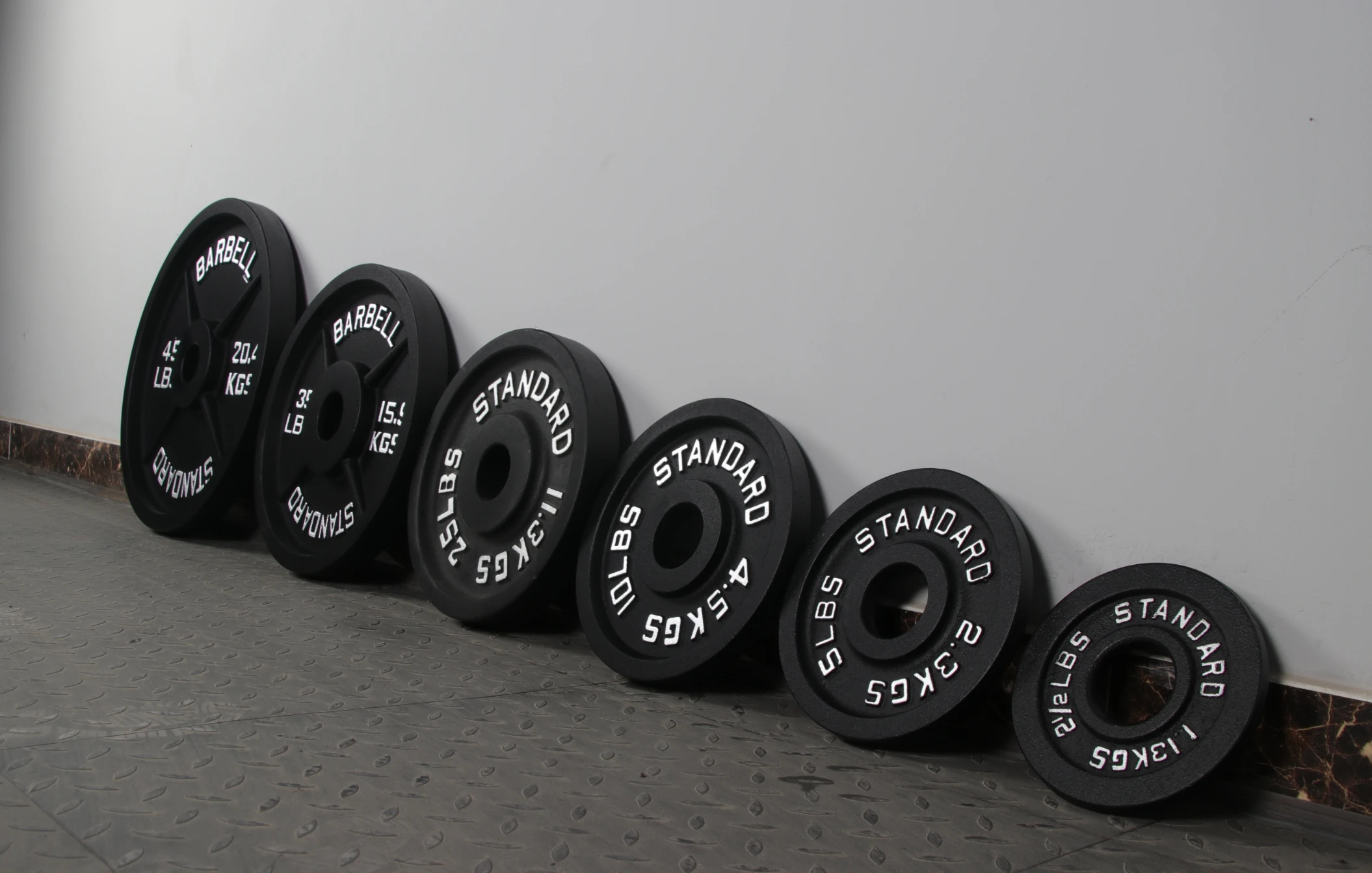 China factory wholesale Gym Fitness Equipment Body Building weight lifting cheap iron weight plates