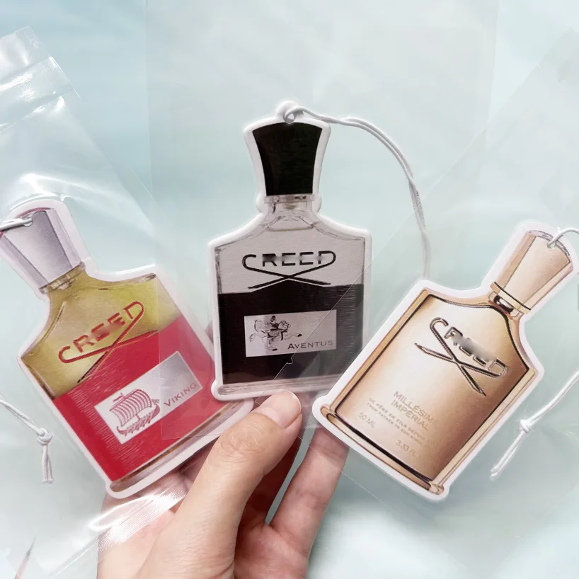 Автомобильный освежитель воздуха в форме флакона