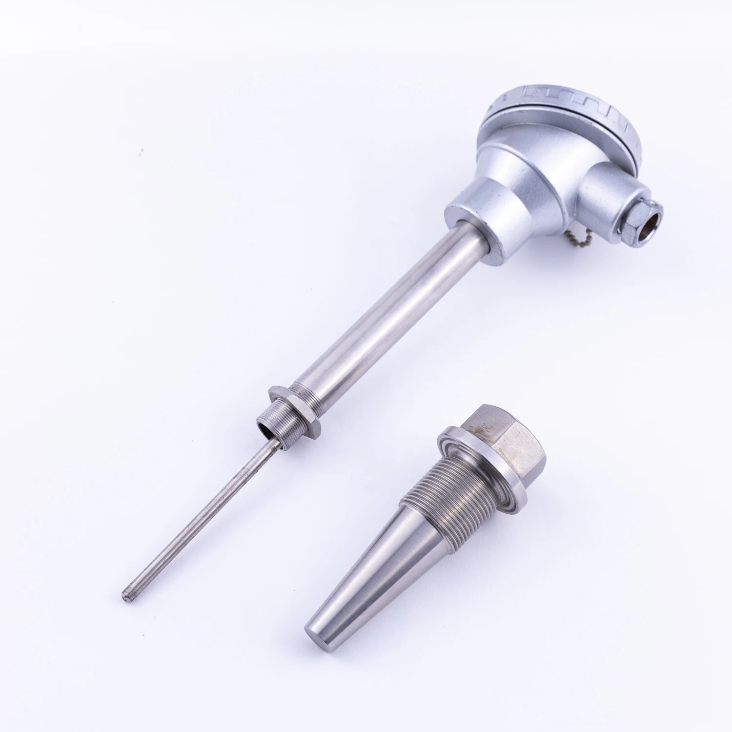 Mineral insulated RTD sensor with thermowell  Thermocouple consists of two wires, each made of different metal, welded together