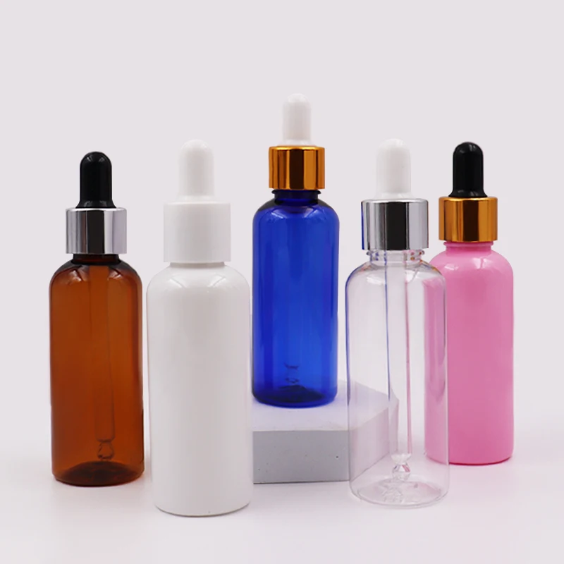 Wholesale 1oz 10ml 30ml 50ml 100ml PET clear amber blue white pink plastic dropper bottle with box