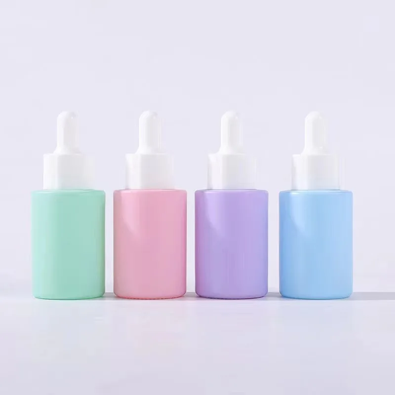 Frosted colorful wholesale cosmetic skincare packaging glass essential oil dropper bottles glass 30ml serum bottle