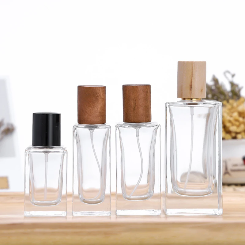 Wholesale Empty 30 Ml 35Ml 50 Ml 100 Ml Clear Square Perfume Empty Bottle With Wooden Cap Frasco De Perfume