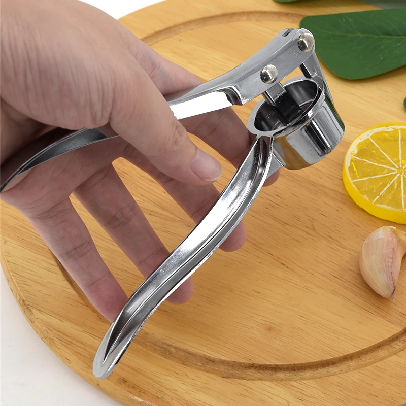 Baichang hot sale Kitchen Tools Garlic Press Manual arc garlic masher for kitchen  stainless steel garlic press