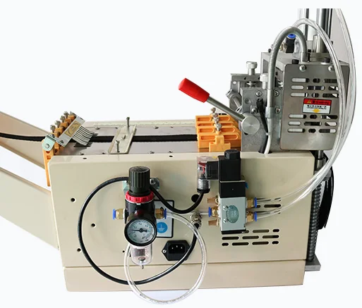 Automatic tape cutting and hole punching all in one machine cutter textile cutting machine for fabric