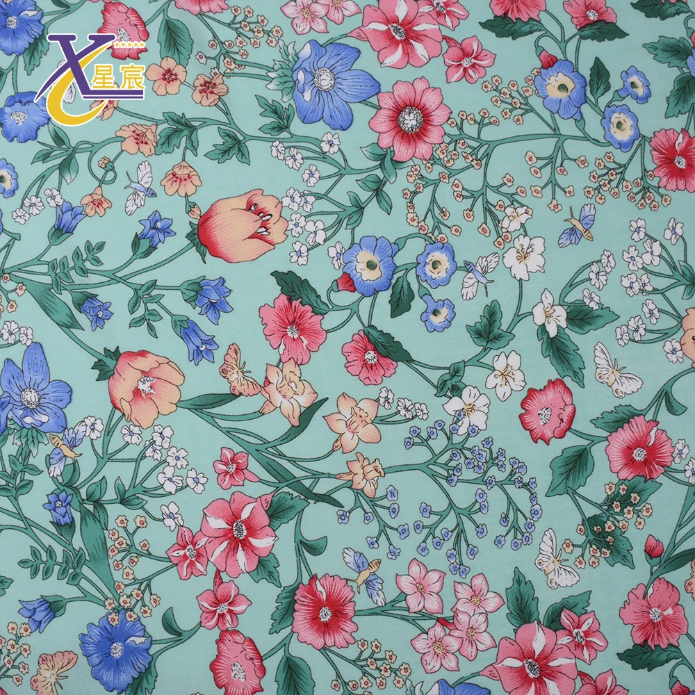 Xingchen Hot sale stock comfortable modern bright 100 rayon fabric printed garment