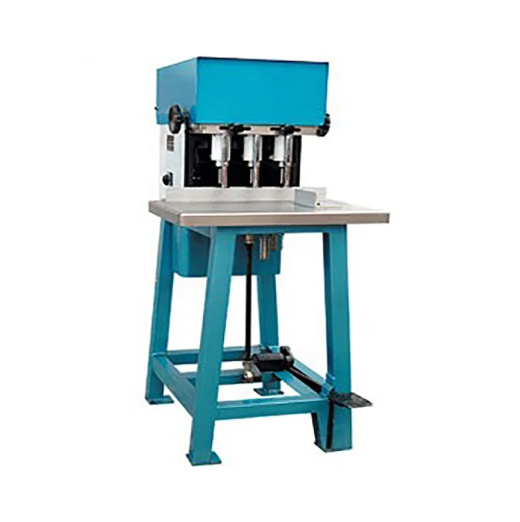 Paper punching machine for notebook and calendar making