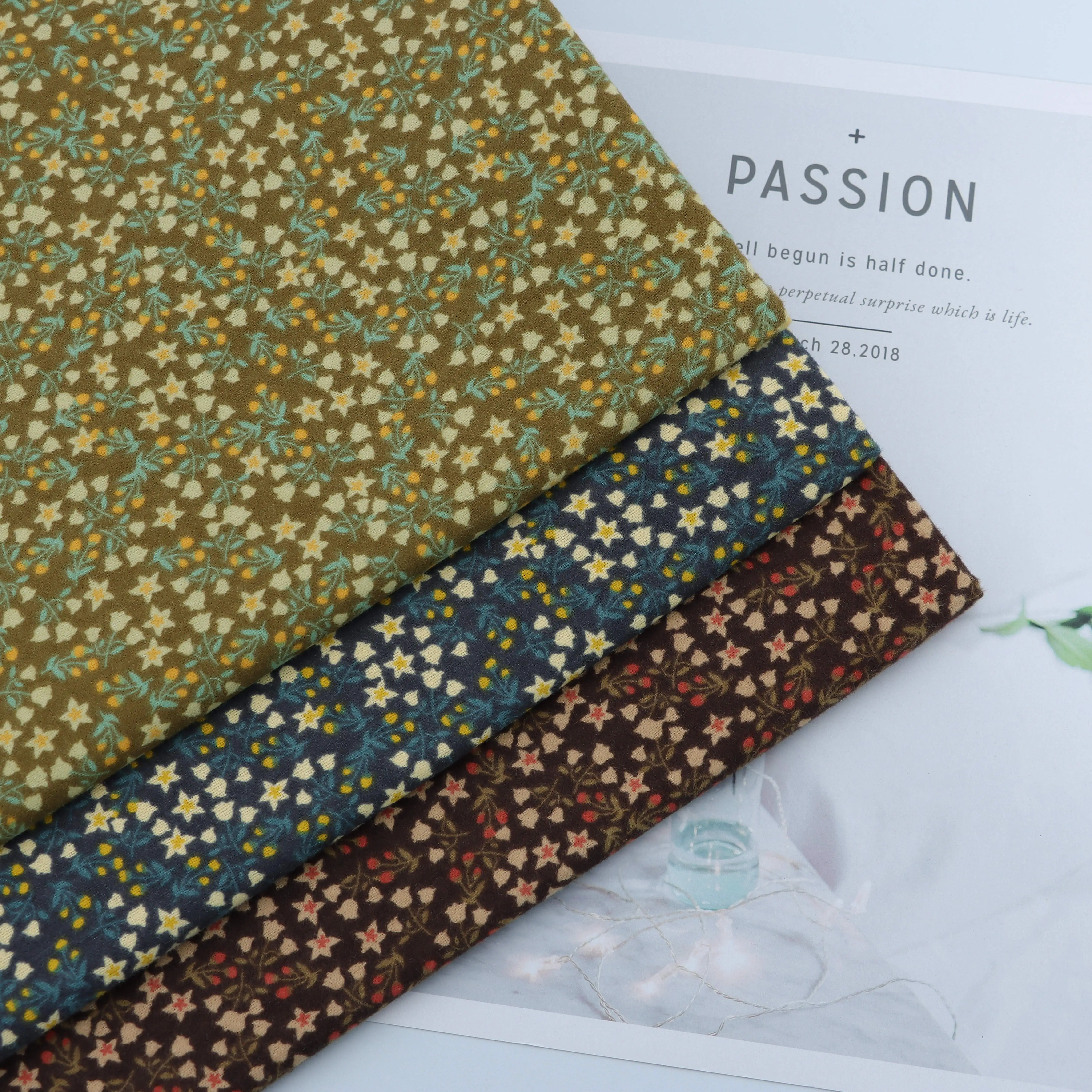 Spot sale of active printed soft single sided cotton wool flannel printing fabric for women children dress