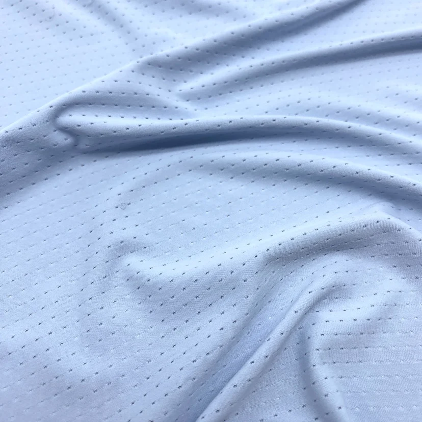 Light blue  16%spandex and 84%nylon  Breathable and quick-drying fabric for sports T-shirt fitness sportswear