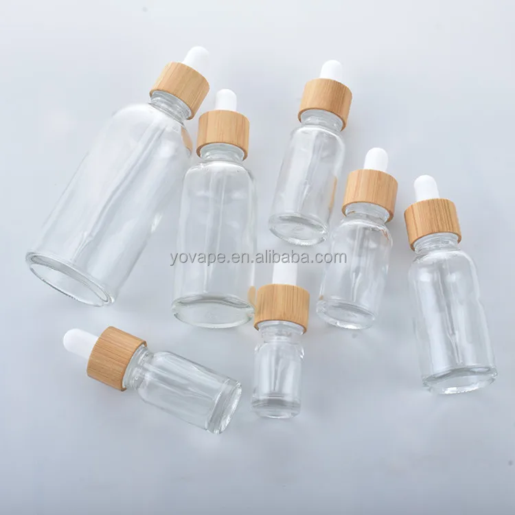 Dispensing cosmetic massage body oil 5ml 10ml 15ml 30ml natural skin care clear serum glass dropper bottle with bamboo cap lid
