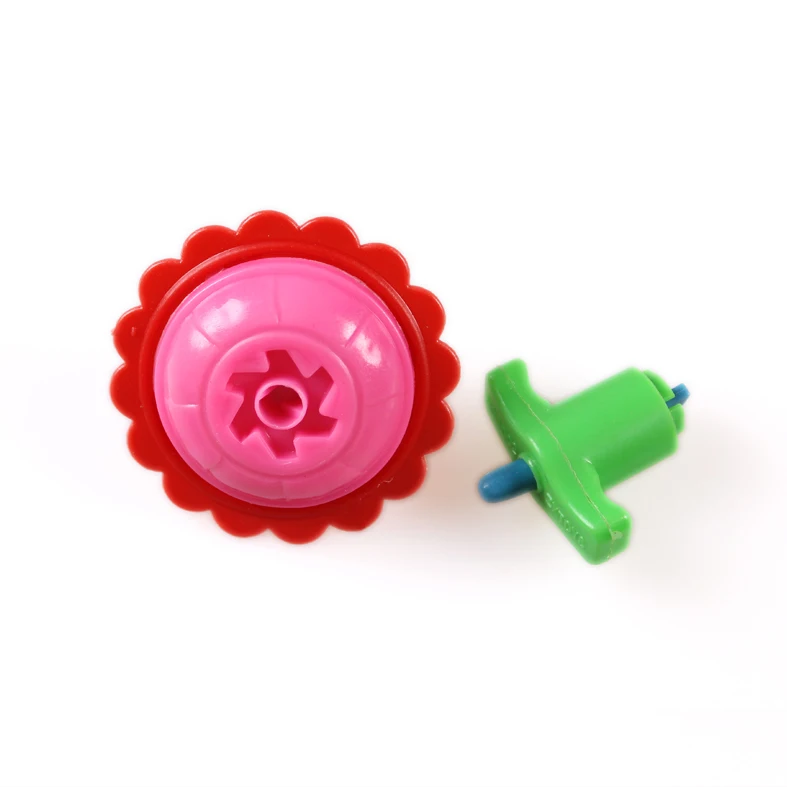 Wholesale Cheap Mini Plastic Winding Pinner Top Toy Import From China