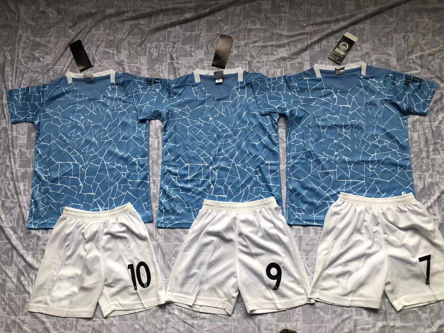 
Wholesale in stock customized top grade thailand quality soccer jersey with cheap price 