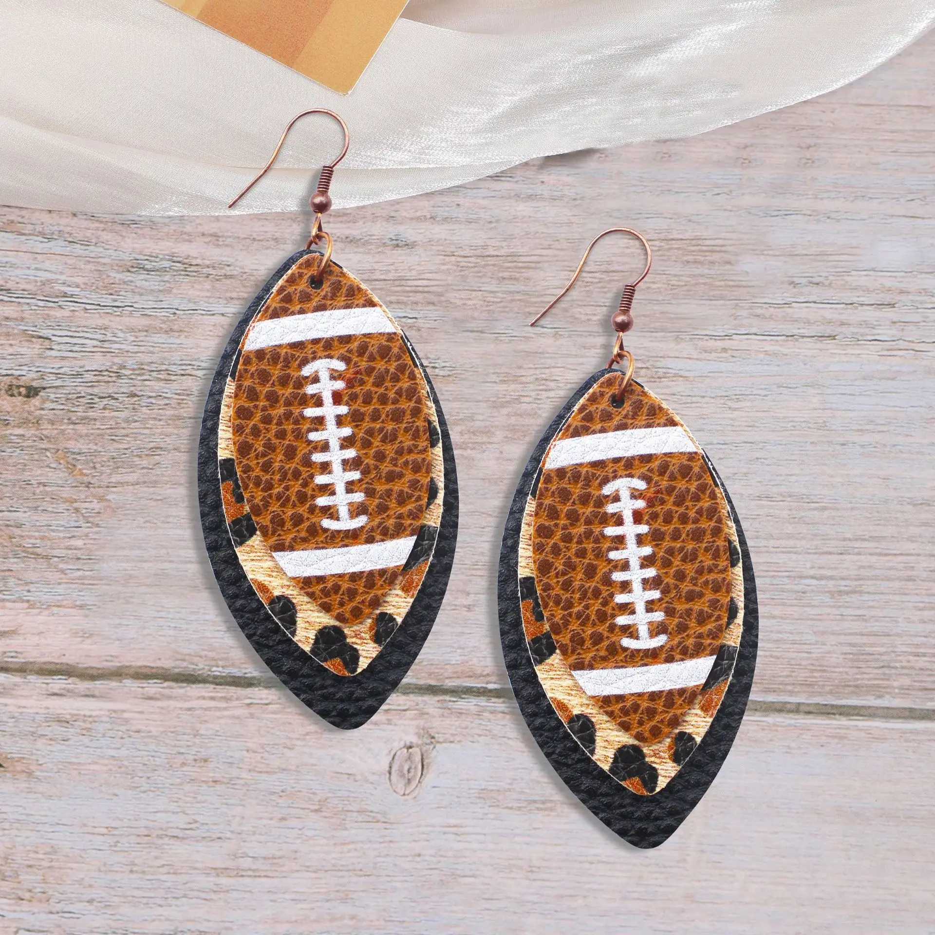 Sporty style rugby brown leopard leaf three-layer leather dot diamond rugby earrings