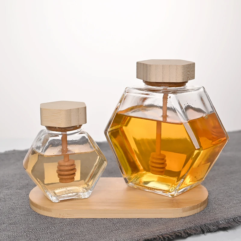 Wholesale 100ml 220ml 380ml Empty Honey bottles Clear Honeycomb hexagon bee shaped Glass Honey Jars with Lid Spoon and Dipper