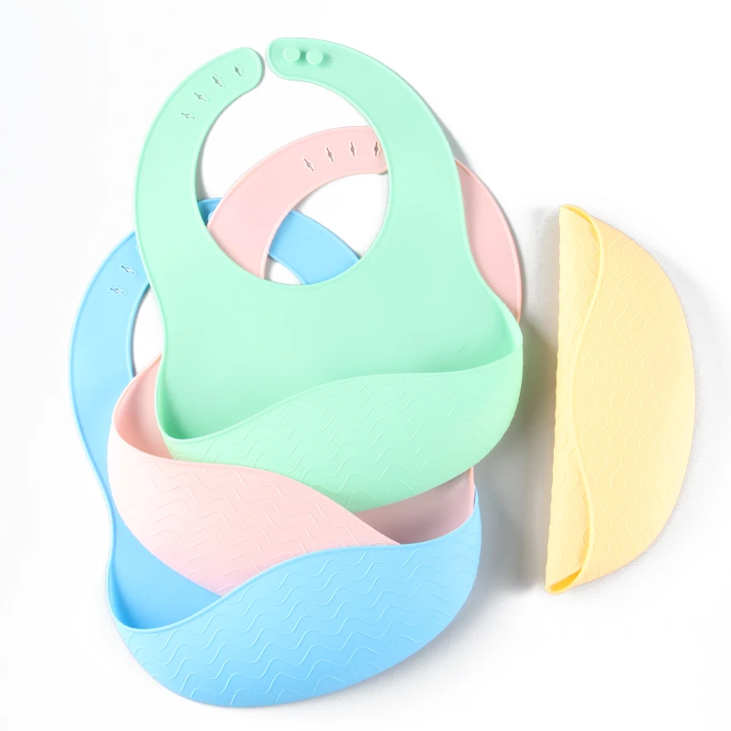 2022 New Product Custom Silicone Waterproof Baby Feeding lightweight thin Bibs Food Catcher pocket baberos