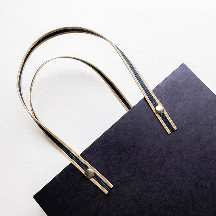 Wholesale high quality printed paper bag shopping bag with rivet and flat handle