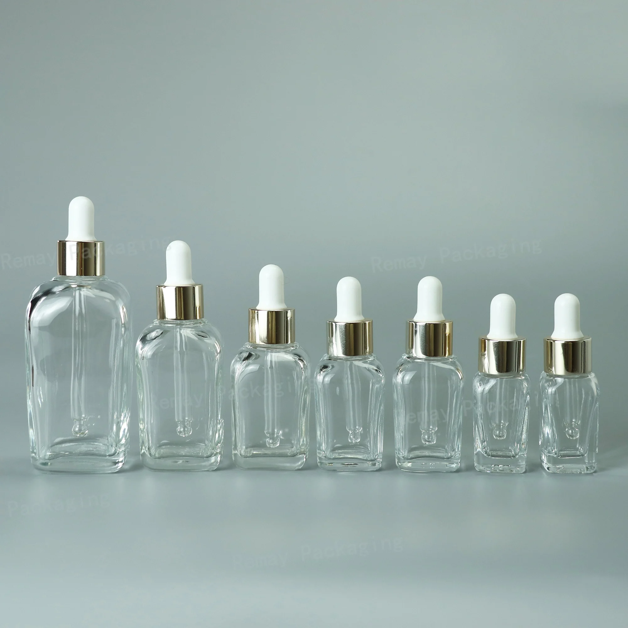 Customized clear square glass essential oil dropper bottle 30ml cosmetic pipette serum bottles with gold dropper cap in stock
