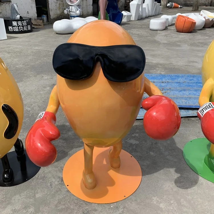 A cartoon sculpture of a glass fiber reinforced plastic mango Fruit model ornaments Outdoor cartoon  Resin fiber figuresculpture