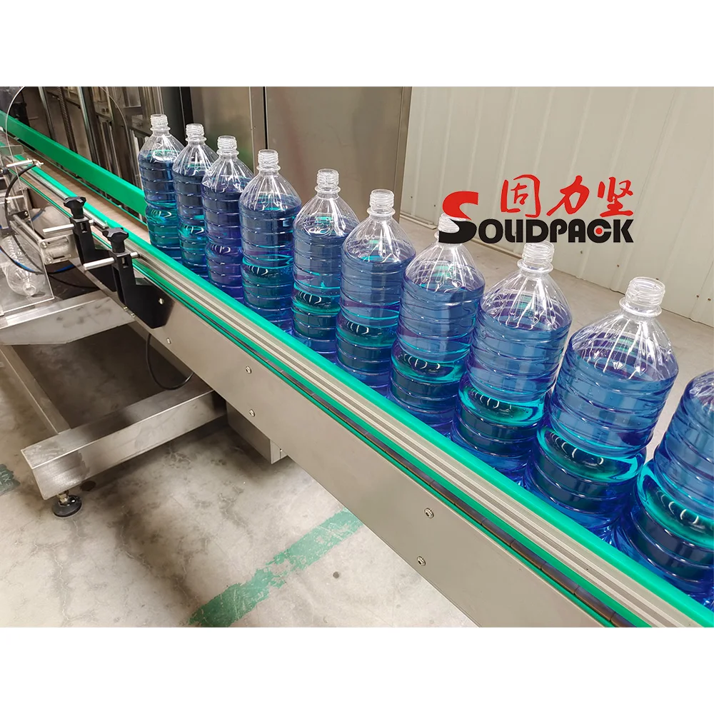 Solidpack automatic glass bottle water Cleaner Liquid 4 Heads Volumetric filling Packing machine 5000