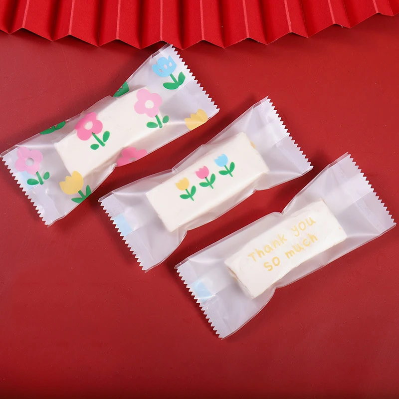 Cute Sweet Chocolate Candy Caramel Heat Seal Transparent Plastic Packaging Nougat Wrapper