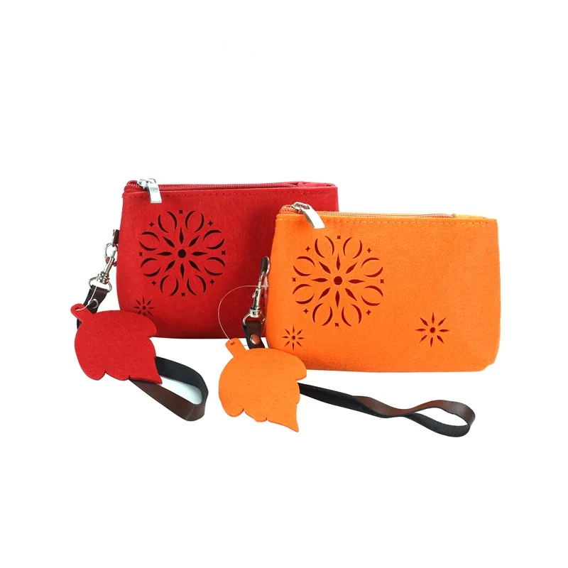 
Wholesale simple hollow felt makeup bag and leather handle style felt cosmetics storage bag can be ordered hollow pattern 